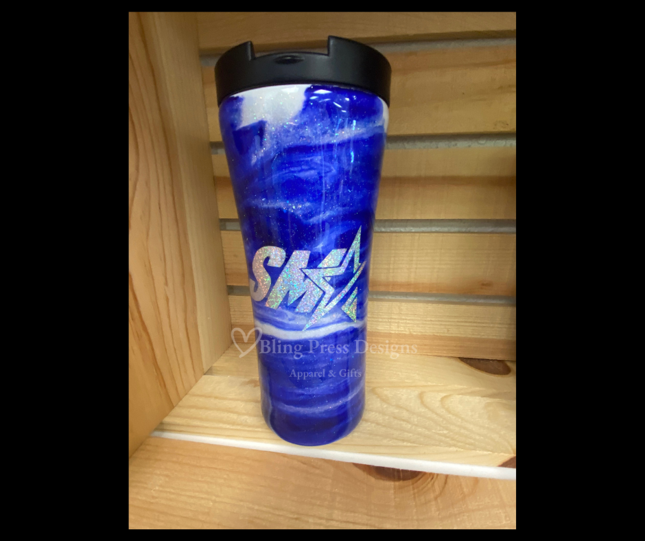 A **SMA Swirl Travel Mug Epoxied Tumbler** featuring a vibrant swirl design and the **SMA** logo, finished with a smooth epoxy coating for durability and shine. Perfect for keeping drinks at the ideal temperature while showcasing school pride.