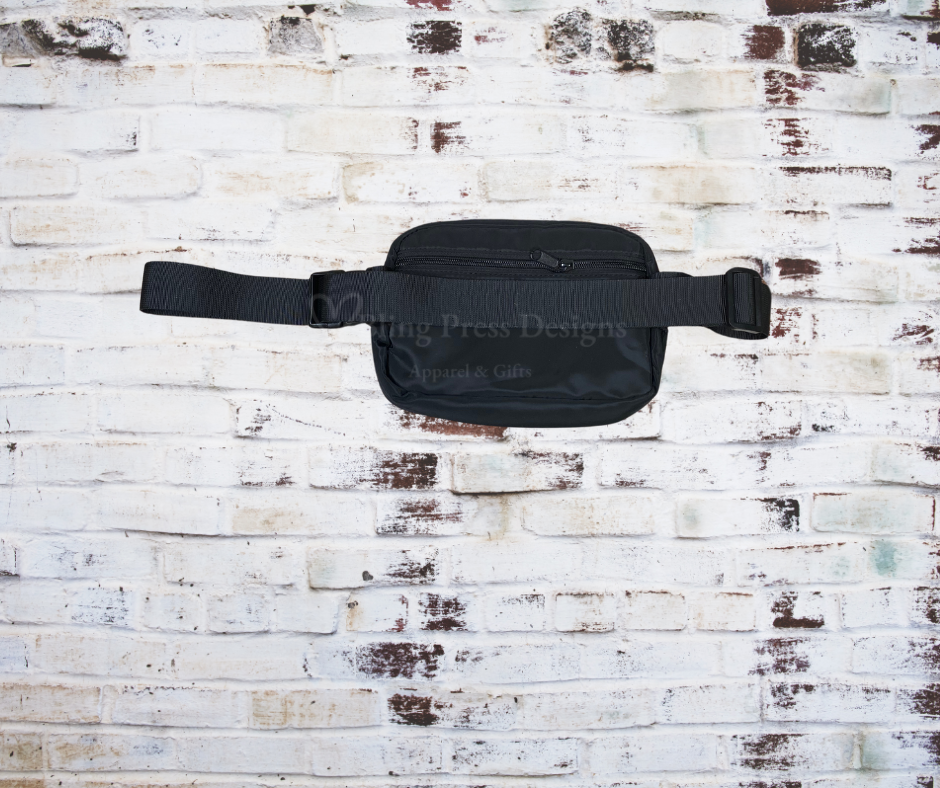 The Back of the Glitter SMA Logo with Rhinestone Scatter Cross Body Bag, featuring a sparkling SMA logo surrounded by rhinestones. A stylish and functional accessory with an adjustable strap, perfect for carrying essentials with a touch of glamour.