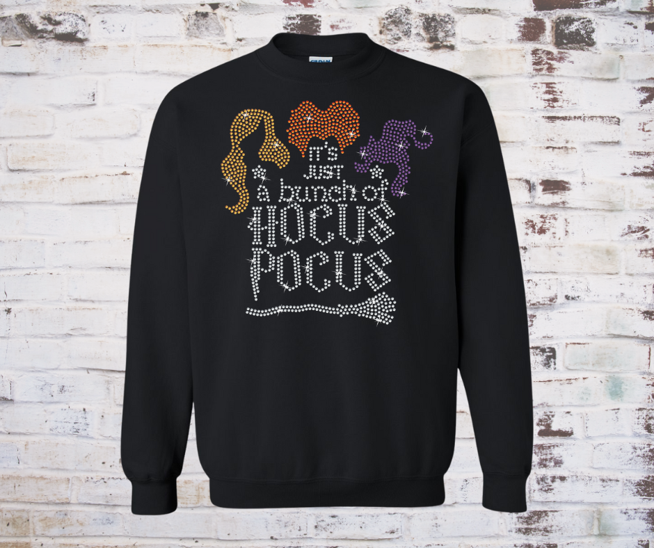 *Colorful rhinestone “Just a Bunch of Hocus Pocus” design on a cozy black sweatshirt, sparkling with festive Halloween bling.*