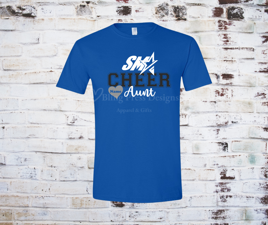 A royal blue "Cheer Aunt" tee with a bold glitter vinyl design, featuring sparkling lettering on soft, breathable fabric. Perfect for showing off cheerleading pride with a stylish, eye-catching touch.