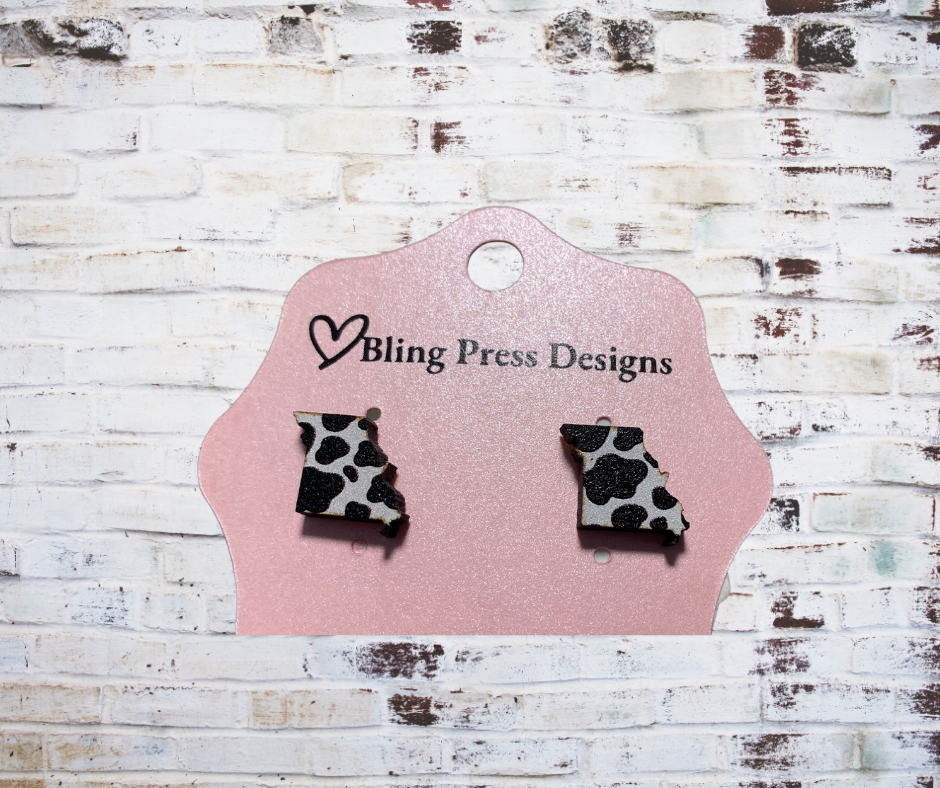 Missouri-shaped wood stud earrings, crafted from lightweight natural wood with a laser-cut design and hand painted with cow print pattern.