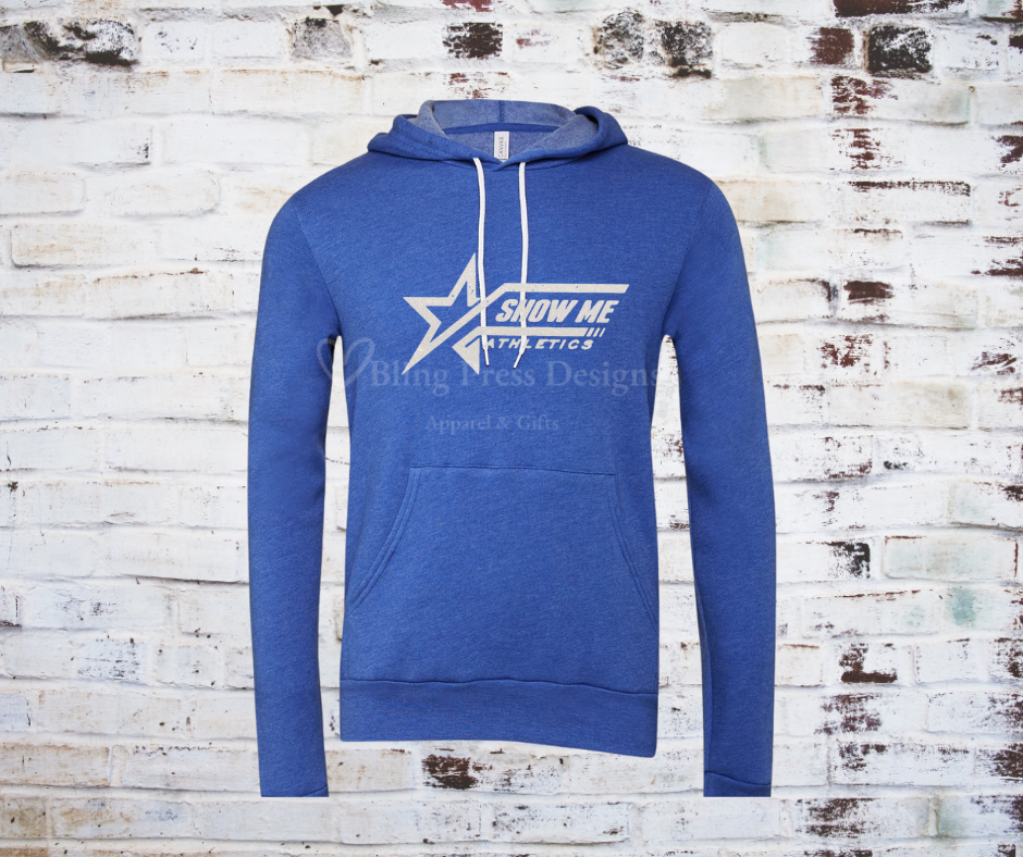 A heathered blue soft and cozy hoodie featuring a white glitter "Show Me" logo, designed with a relaxed fit, front pocket, and adjustable drawstring hood.
