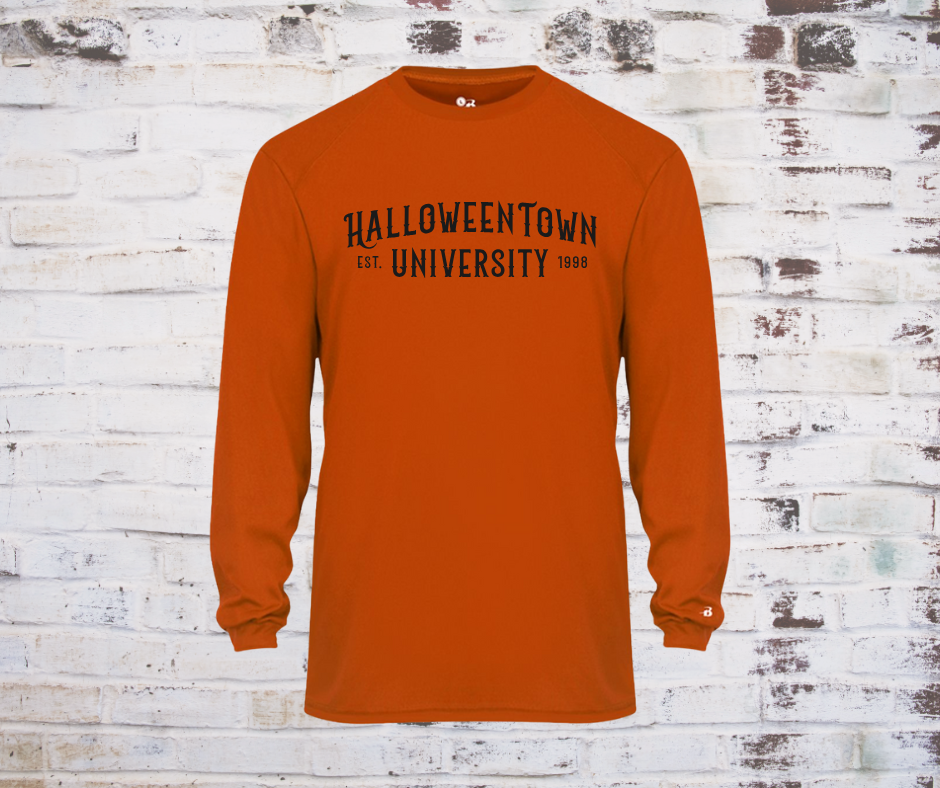 Burnt orange long sleeve t-shirt with bold black “Halloween Town University” print on the front, styled for Halloween and fall wear.