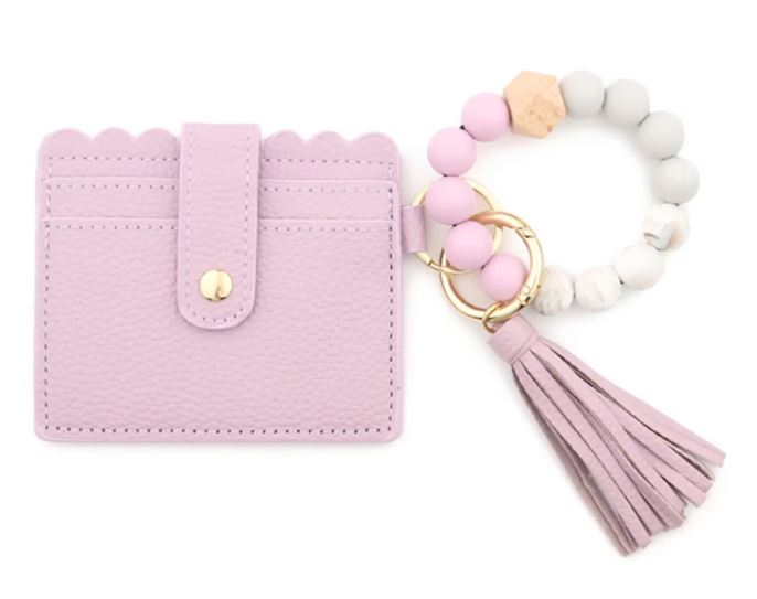A lavender stylish silicone beaded wristlet with soft, flexible beads on a durable elastic cord, designed for comfortable wear and hands-free key or accessory carrying.