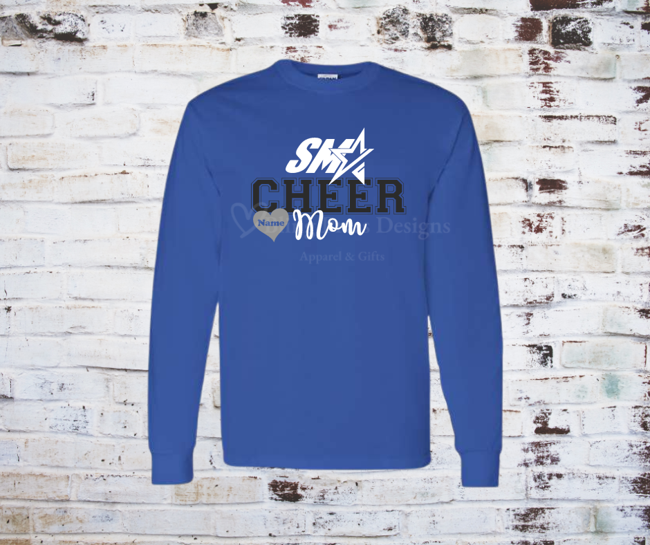 A royal blue "Cheer Mom" tee with a bold glitter vinyl design, featuring sparkling lettering on soft, breathable fabric. Perfect for showing off cheerleading pride with a stylish, eye-catching touch.