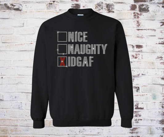 A rhinestone Christmas sweatshirt featuring a funny holiday checklist design with the options Nice, Naughty, and IDGAF, with a checkmark next to IDGAF.