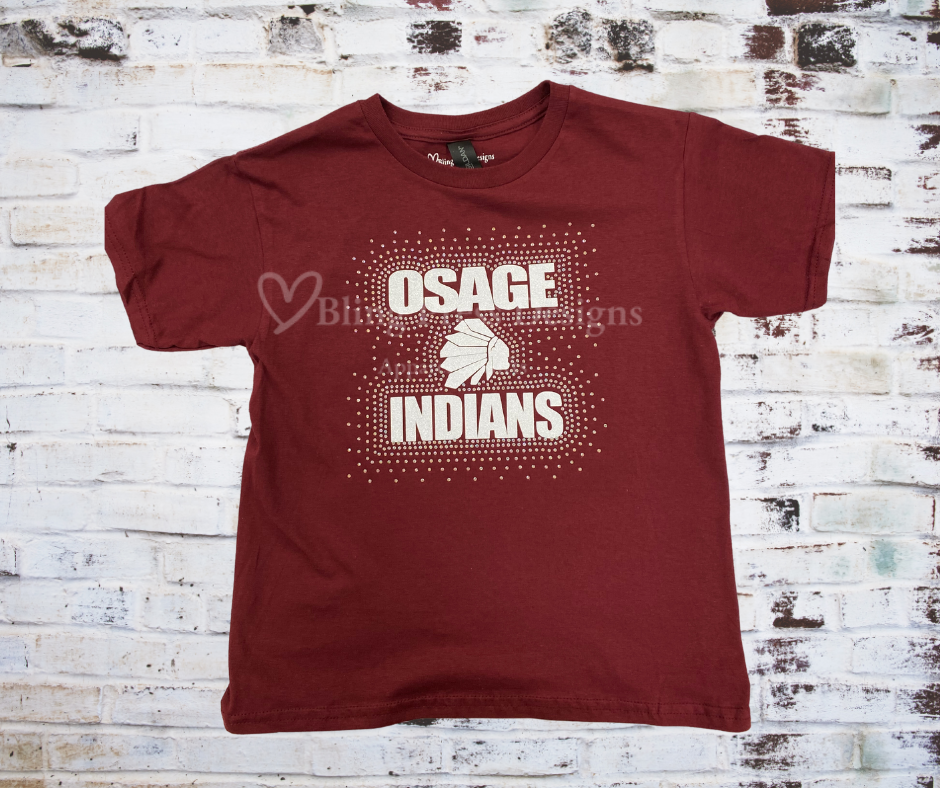 An Osage Indians tee featuring a bold glitter vinyl design and rhinestone accents, crafted from soft, breathable fabric.