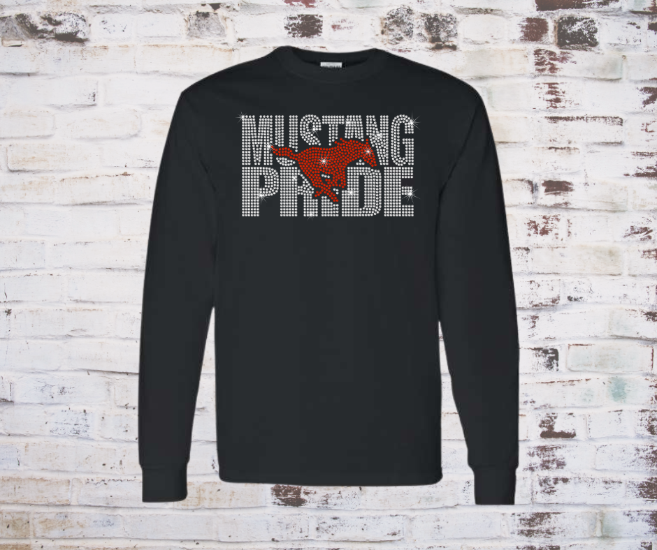 Long Sleeve Tee Shirt featuring a sparkling rhinestone design of a galloping mustang with the words “Mustang Pride.” The rhinestones shimmer in the light, creating a bold and spirited look perfect for showing team pride.