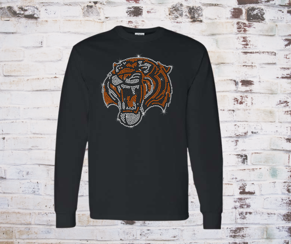 Black long-sleeve shirt with a rhinestone tiger logo on a rustic wooden background