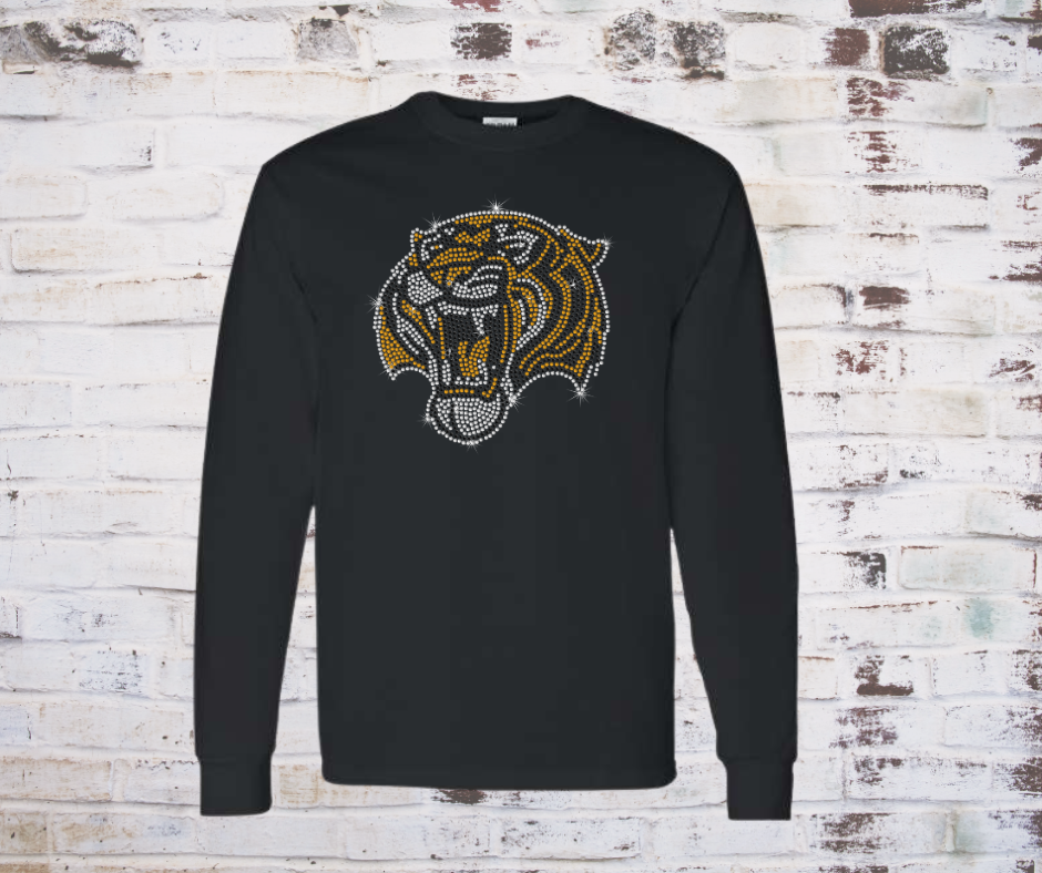 Black long-sleeve shirt with a rhinestone tiger logo on a rustic wooden background