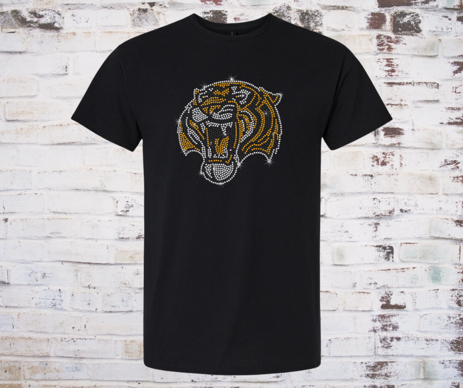 Black t-shirt with a rhinestone tiger logo on a wooden background