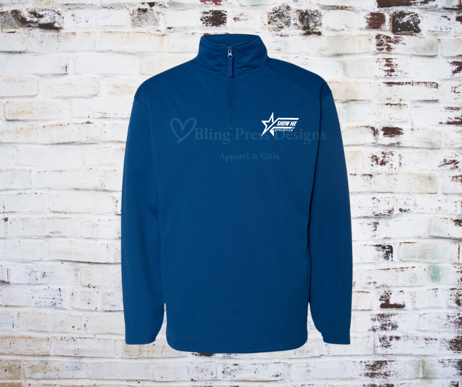 A Men's Performance Fleece Pullover made from soft, moisture-wicking fabric, featuring a Show Me Athletics logo on the chest. Designed for comfort, warmth, and movement, perfect for athletic activities or casual wear.