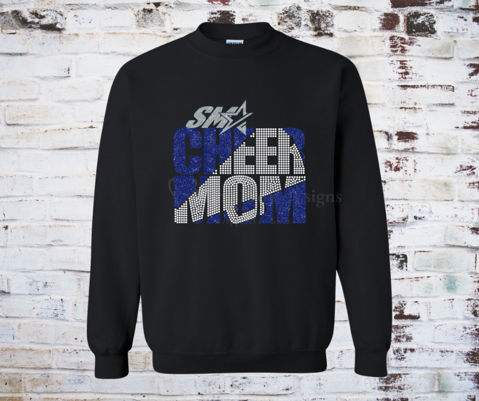 A Rhinestone and Glitter Vinyl Cheer Mom Tee, featuring a sparkling Cheer Mom design with glitter vinyl and rhinestone accents. Made from soft, breathable fabric for a stylish and comfortable look at cheer events or everyday wear.