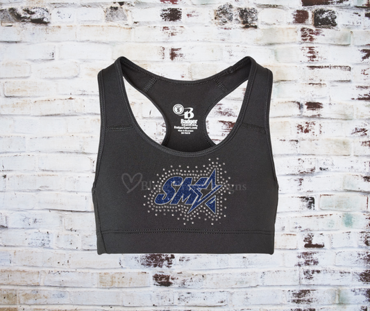 A Glitter SMA Logo with Rhinestone Spray Sports Bra, featuring a shimmering glitter vinyl SMA logo and rhinestone accents. Made from breathable, moisture-wicking fabric for stylish comfort and support during workouts or cheer practice.