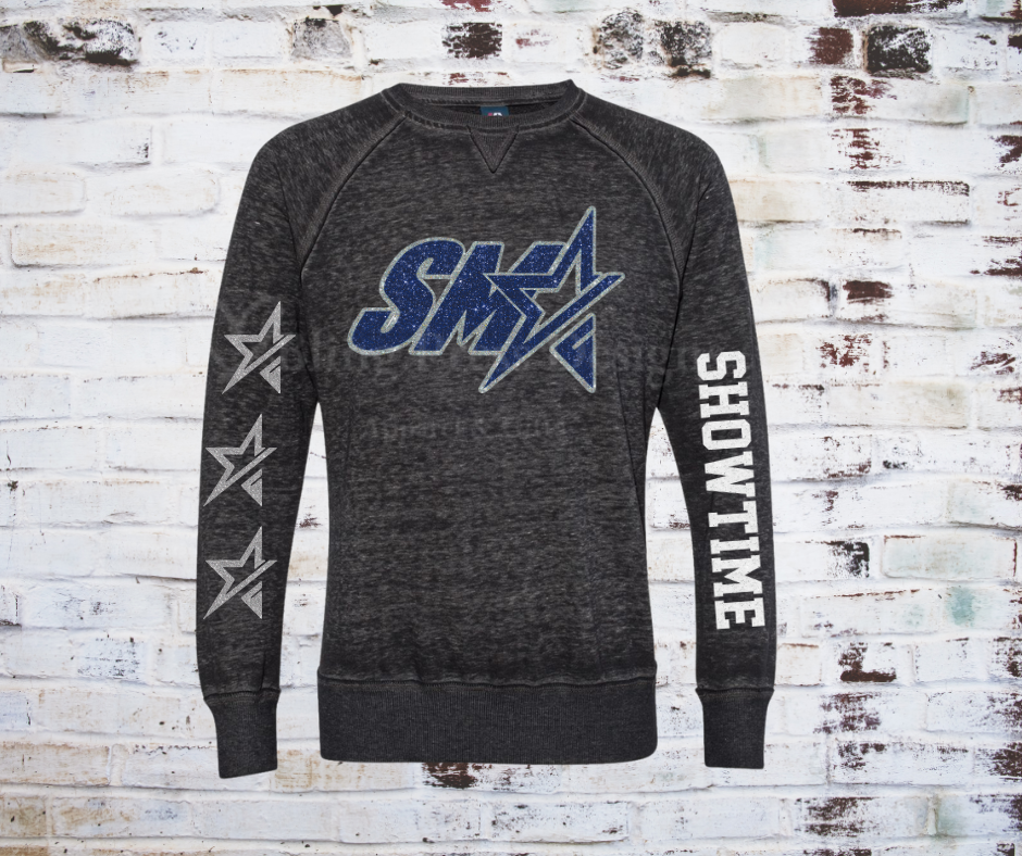 A **Glitter SMA Logo Showtime Team Sweatshirt**, featuring a bold **SMA** logo in glitter vinyl on soft, comfortable fabric. A cozy and stylish way to showcase school spirit with a sparkling touch.