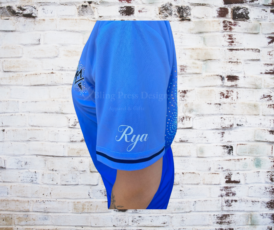 A side view of the Show Me Rhinestone Jersey featuring a glitter vinyl logo and rhinestone accents, combining sporty style with a sparkling design.
