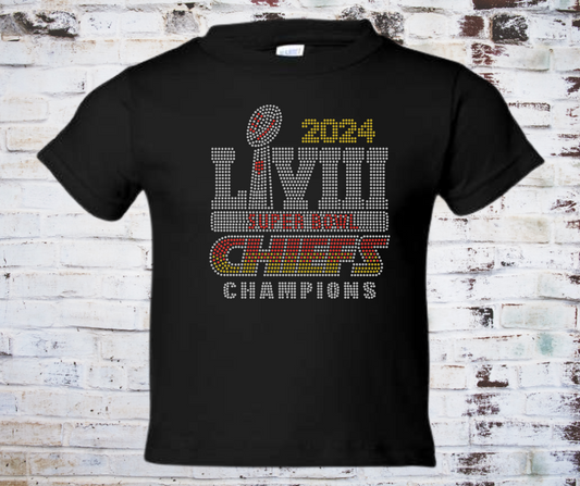 A **Rhinestone Super Bowl Tee** featuring a bold **Super Bowl** design adorned with shimmering rhinestones. Made from soft, breathable fabric for comfort, perfect for celebrating game day in style.