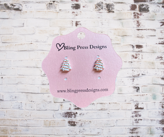 Small Christmas tree cake stud earrings featuring a festive green tree design with holiday details.