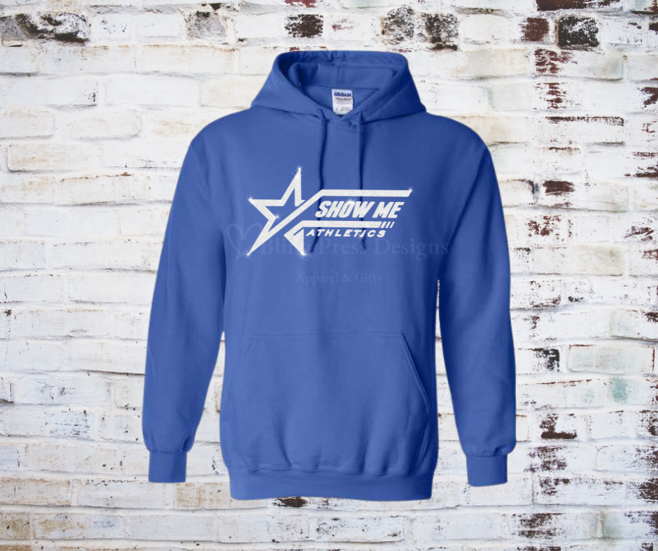 A royal blue soft and cozy hoodie featuring a white glitter "Show Me" logo, designed with a relaxed fit, front pocket, and adjustable drawstring hood.