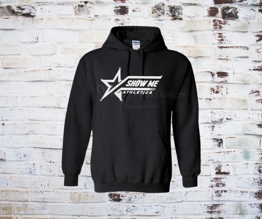 A black soft and cozy hoodie featuring a white glitter "Show Me" logo, designed with a relaxed fit, front pocket, and adjustable drawstring hood.