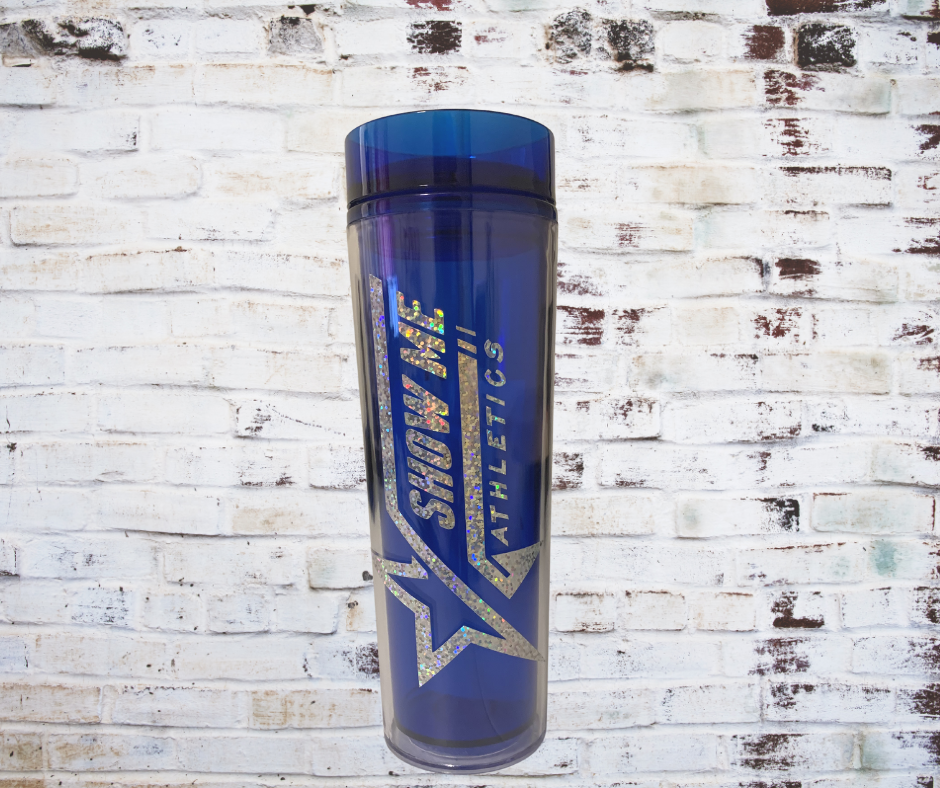 Blue acrylic tumbler with a Show Me Athletics logo, featuring a secure lid and straw for easy sipping