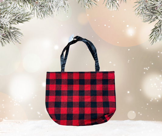 A red and black buffalo plaid zipper tote bag with spacious interior, sturdy construction, and comfortable straps, perfect for everyday use or adding a cozy touch to seasonal outings.