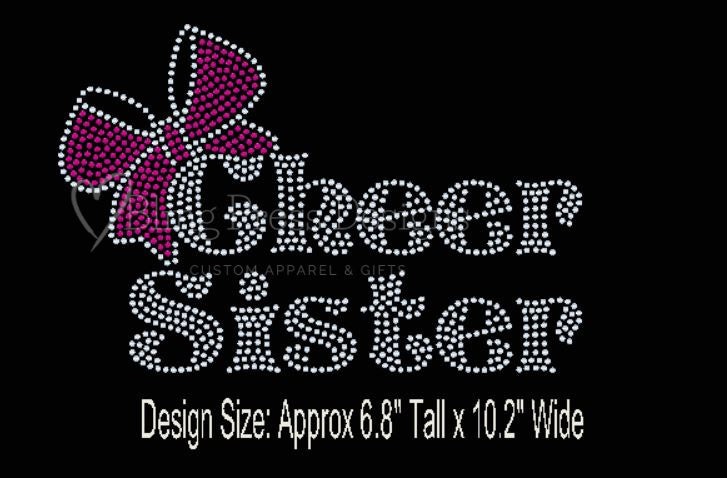 Close-up of a 'Cheer Sister' rhinestone design with a sparkling bow accent on a soft, comfortable tee