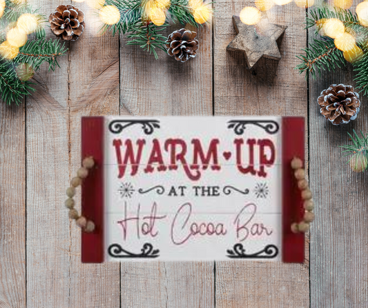 A rustic wood serving tray designed for a hot cocoa bar, featuring a spacious surface to organize mugs, cocoa mix, and toppings, perfect for creating a cozy, festive holiday setup.