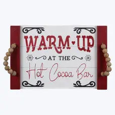 A rustic wood serving tray designed for a hot cocoa bar, featuring a spacious surface to organize mugs, cocoa mix, and toppings, perfect for creating a cozy, festive holiday setup.