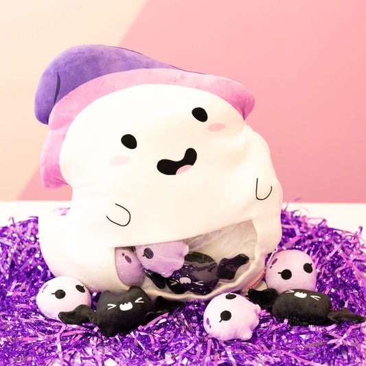 A soft, squishy ghost mini plushie pillow with a cute and playful design, perfect for cuddling or Halloween decor