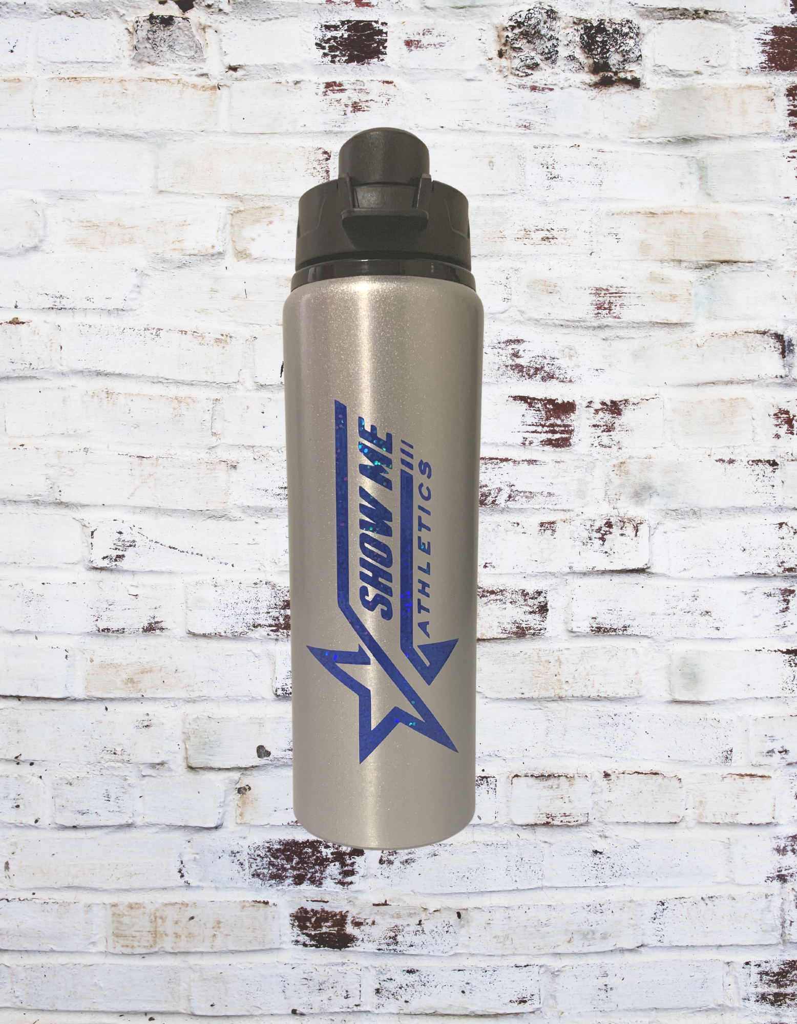 A 27oz Single Walled Stainless Steel Water Bottle featuring the Show Me logo, designed for durability and style. Perfect for keeping drinks at the ri