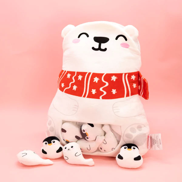 A set of a Polar Bear Pillow and matching mini plushies, featuring soft, cuddly designs with adorable details. The pillow is shaped like a polar bear, and the mini plushies are small, cute versions of penguins and seals, perfect for snuggling or decorating.