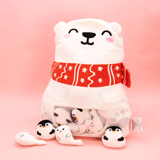 A set of a Polar Bear Pillow and matching mini plushies, featuring soft, cuddly designs with adorable details. The pillow is shaped like a polar bear, and the mini plushies are small, cute versions of penguins and seals, perfect for snuggling or decorating.