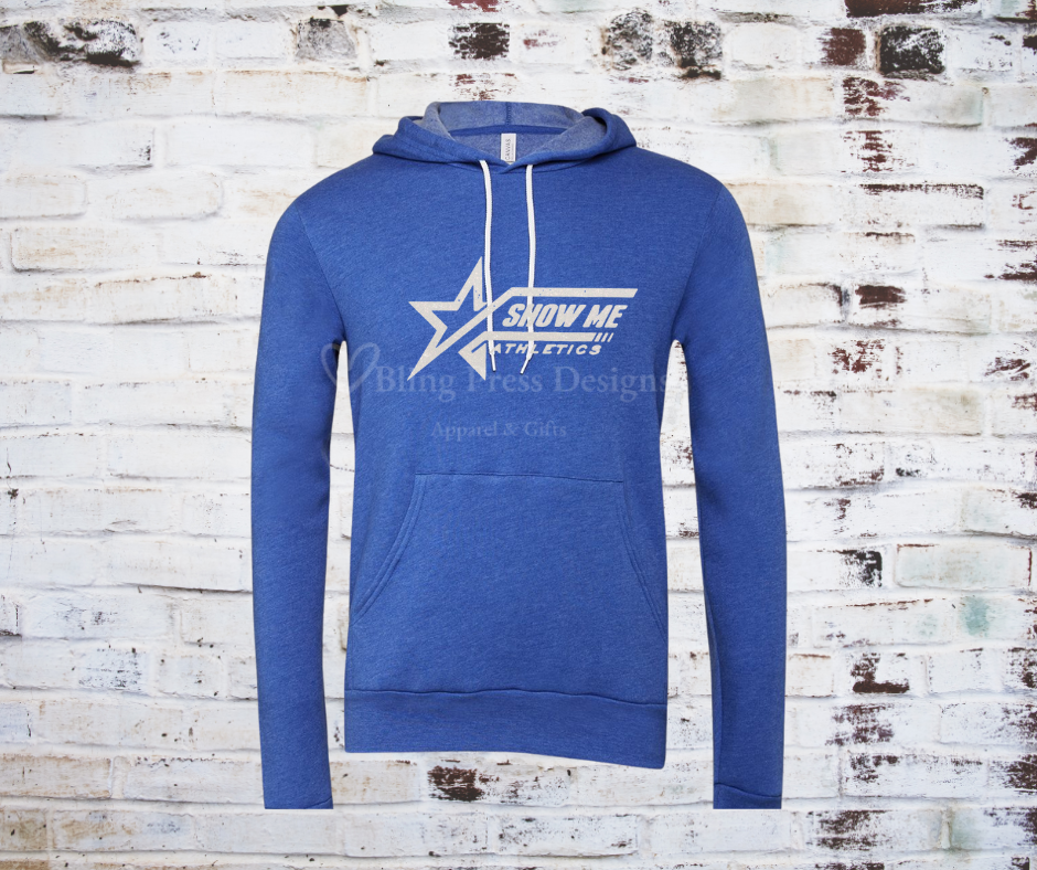 A heathered blue soft and cozy hoodie featuring a white glitter "Show Me" logo, designed with a relaxed fit, front pocket, and adjustable drawstring hood. 