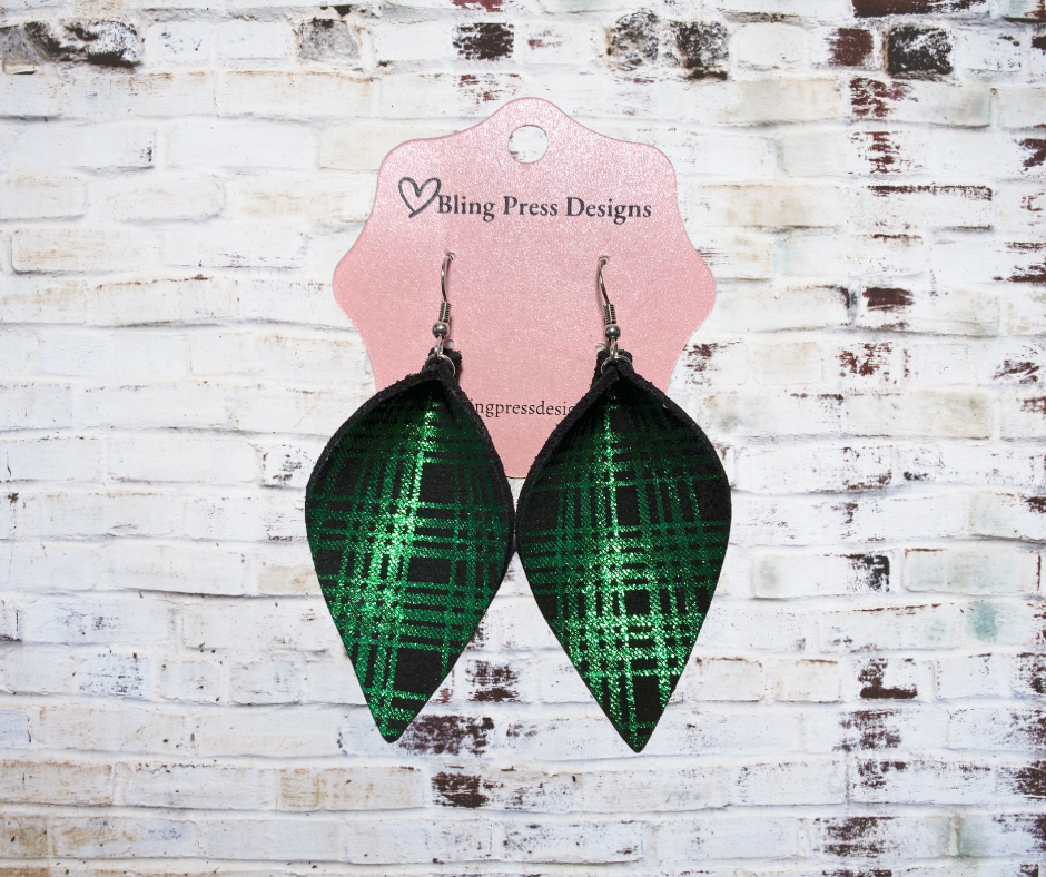 Faux leather metallic green plaid petal dangle earrings, featuring petal-shaped layers with a shiny metallic green finish and a classic plaid pattern. 