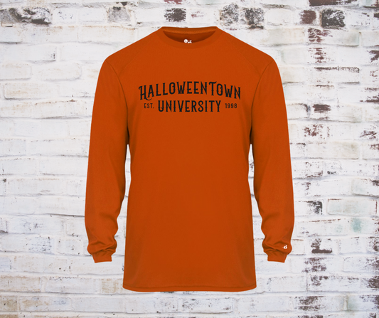 Burnt orange long sleeve t-shirt with bold black “Halloween Town University” print on the front, styled for Halloween and fall wear.
