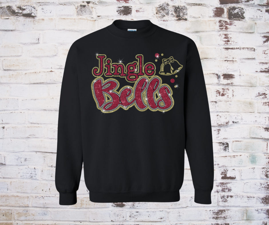 Black sweatshirt with 'Jingle Bells' text on a rustic wooden background