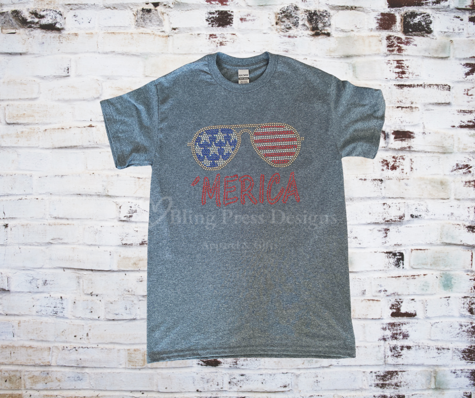 Dark Grey T-shirt with rhinestoned sunglasses with american flag design and the test 'Merica in red rhinestones. 