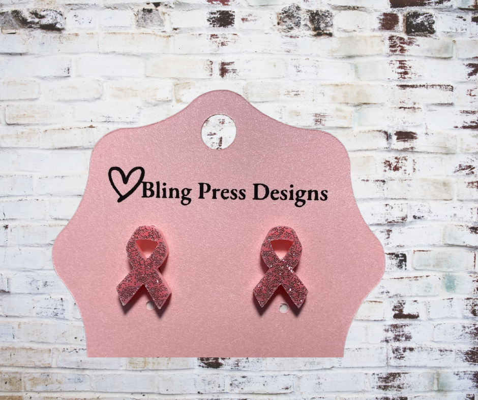 Glitter stud earrings in assorted shapes including animals and food designs, featuring hypoallergenic posts for sensitive ears.