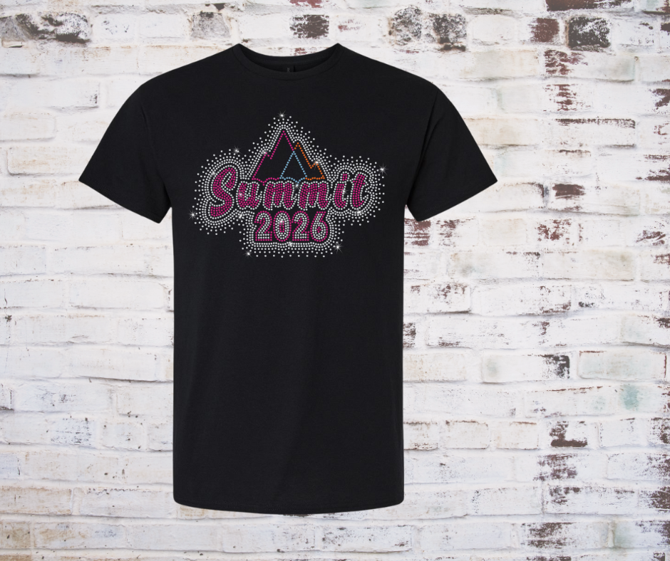 Black t-shirt with 'Summit 2026' Rhinestone design on a brick wall background