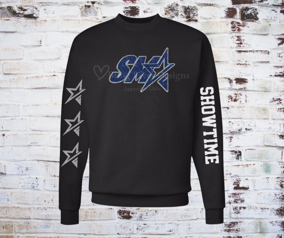 A **Glitter SMA Logo Showtime Team Sweatshirt**, featuring a bold **SMA** logo in glitter vinyl on soft, comfortable fabric. A cozy and stylish way to showcase school spirit with a sparkling touch.