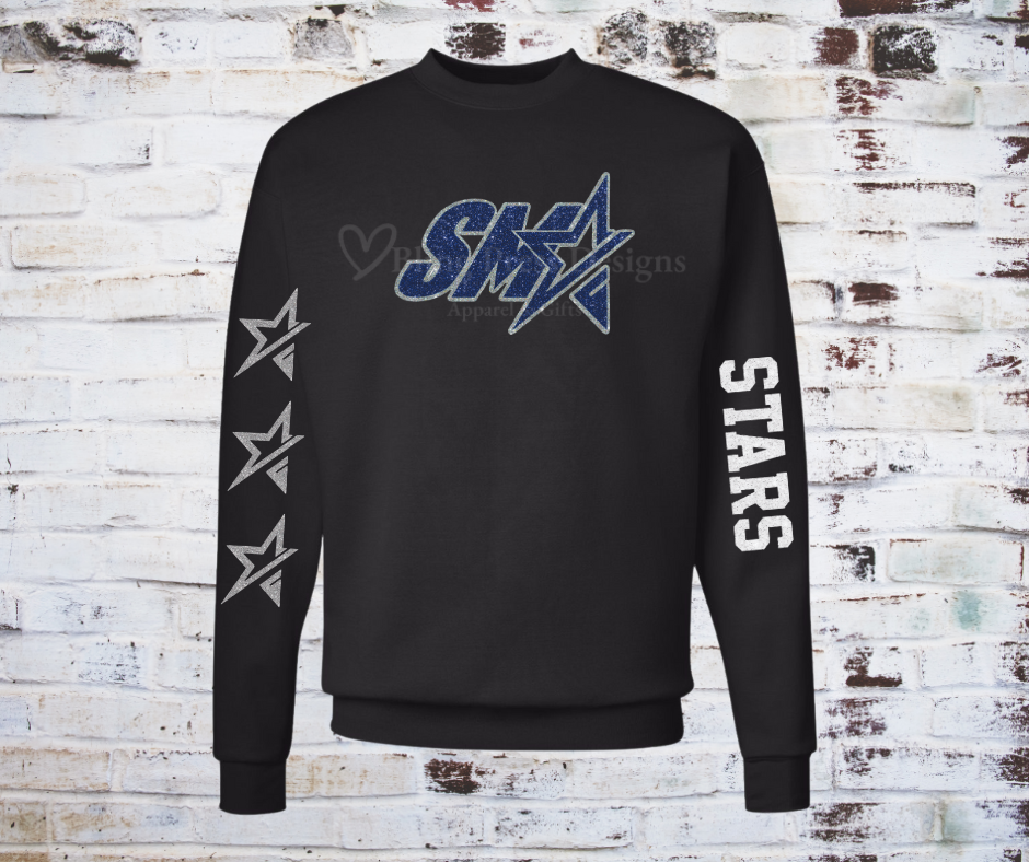 A **Glitter SMA Logo Stars Team Sweatshirt**, featuring a bold **SMA** logo in glitter vinyl on soft, comfortable fabric. A cozy and stylish way to showcase school spirit with a sparkling touch.