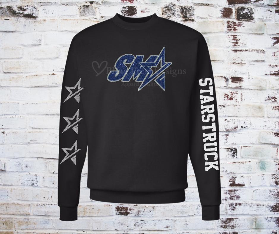 A **Glitter SMA Logo Starstruck Team Sweatshirt**, featuring a bold **SMA** logo in glitter vinyl on soft, comfortable fabric. A cozy and stylish way to showcase school spirit with a sparkling touch.