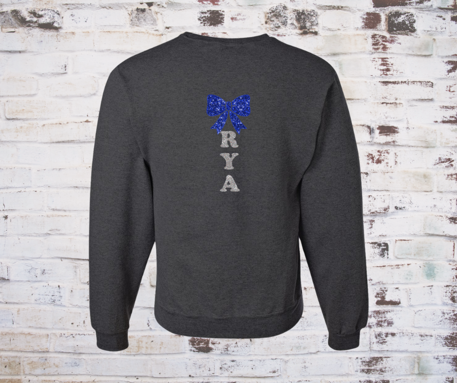 Dark gray sweatshirt with a blue bow and 'RYA' text on the back against a rustic wooden background