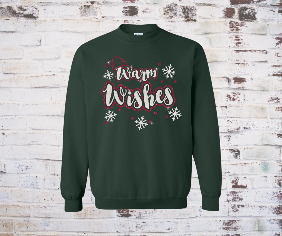 Green sweatshirt with 'Warm Wishes' text on a rustic wooden background
