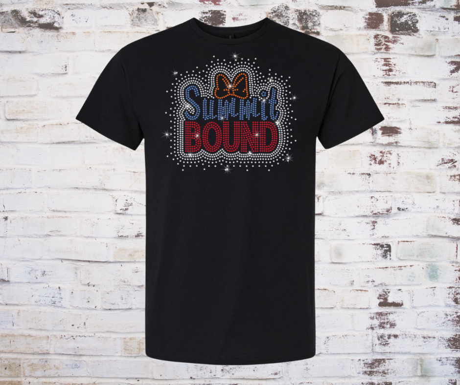 Black t-shirt with 'SUMMit BOUND' rhinestone text and bow design on a rustic wooden background