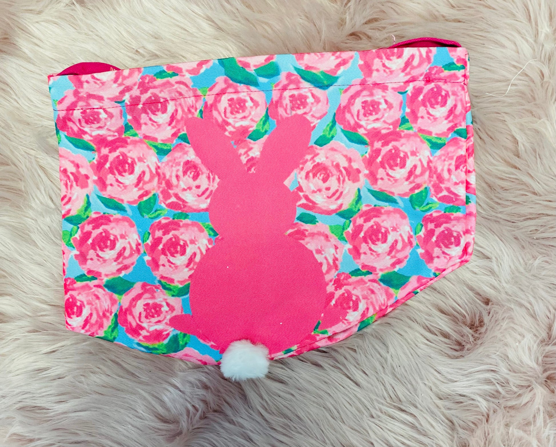 Pink Roses personalized canvas Easter basket with glitter vinyl lettering, featuring a bunny silhouette with cotton tail, sturdy handle and a spacious design, perfect for Easter egg hunts and gifts. 